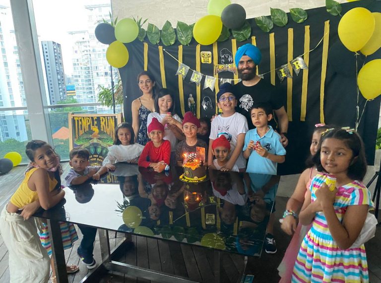 kids-birthday-cake-cutting-singapore.jpg