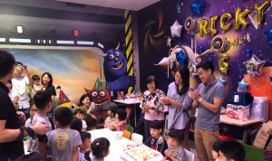 Kids birthday cake cutting celebration in Singapore